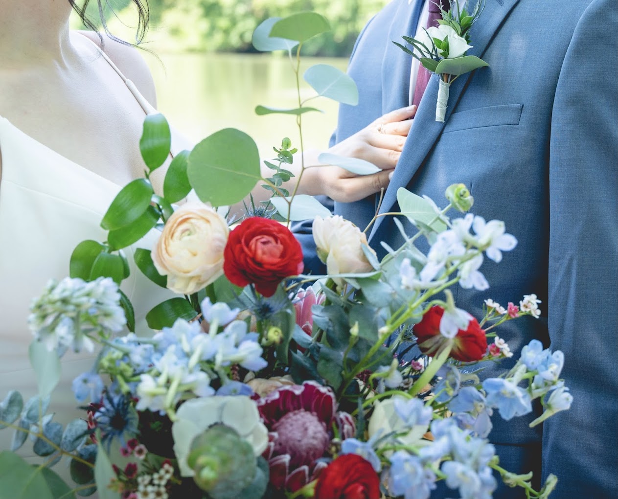 bouquet between couple at wedding