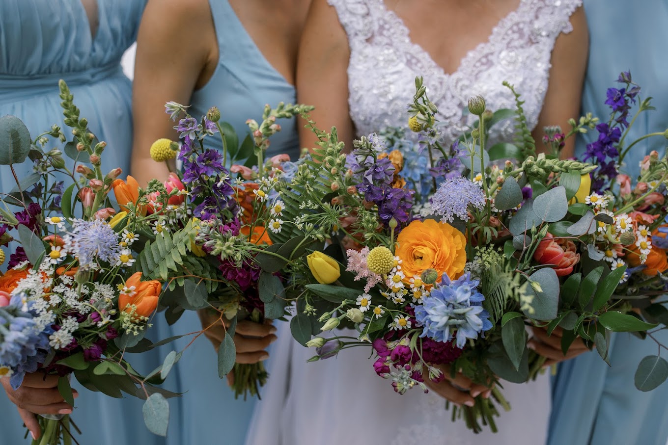 bridesmaids holding bouquets