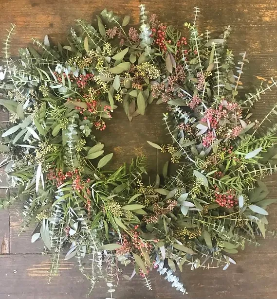 multi-textured wreath with light red accents